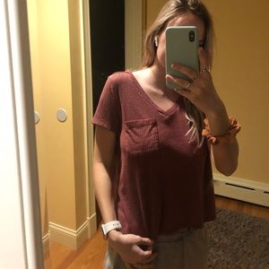 Pinkish colored v neck tee shirt